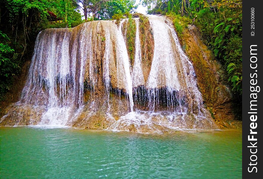 The View Of The Waterfall Is So Beautiful That It Spoils The Eye Of The Beholder. The Location Is Bantul District, Yogyakarta Prov