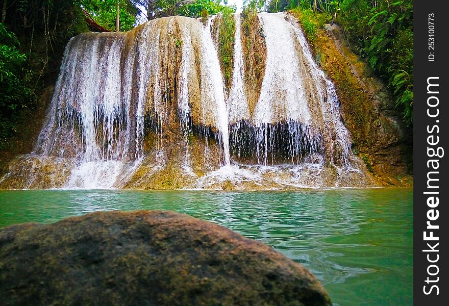 The waterfall is so beautiful like a curtain during the day in Bantul district, Yogyakarta province.