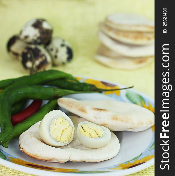 Boiled Quail Eggs And Hot Peppers