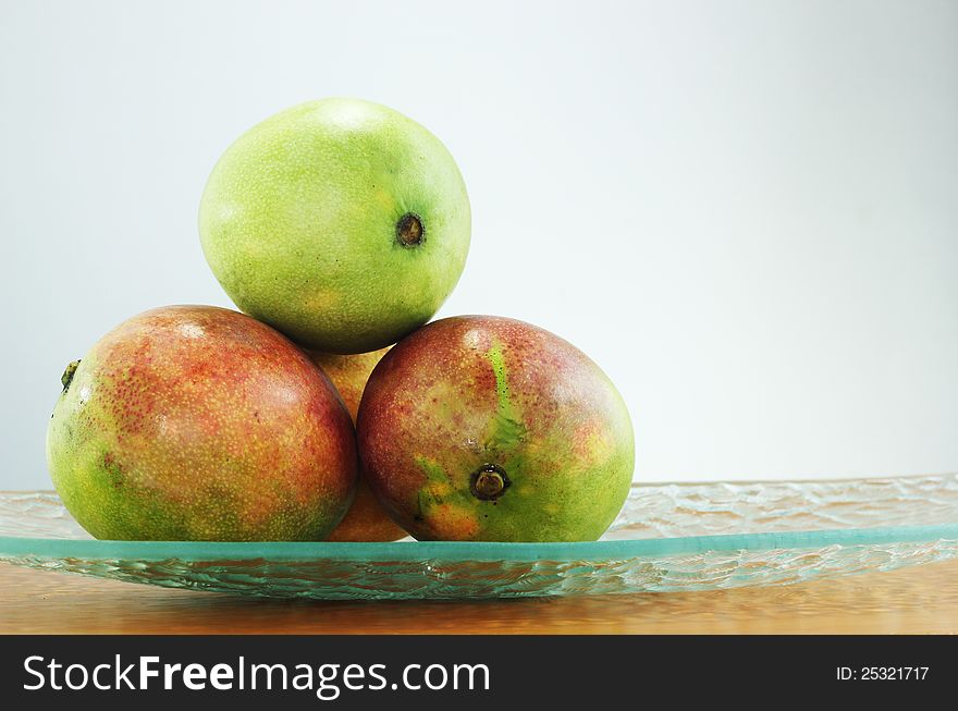 Green and ripe mangoes produced in the Dominican countryside