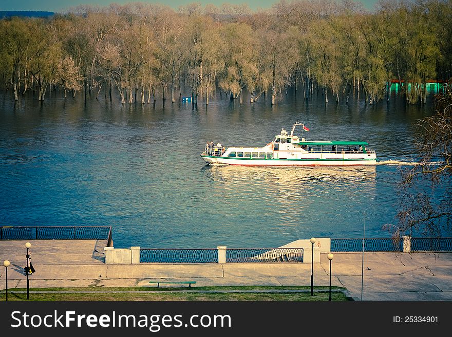 Passenger cruise ship on River