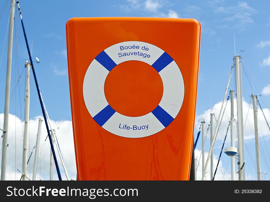 Orange Life-Buoy at disposal on the catway. Orange Life-Buoy at disposal on the catway