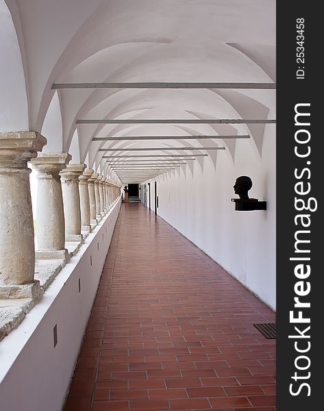 Corridor with arcades in the old castle.