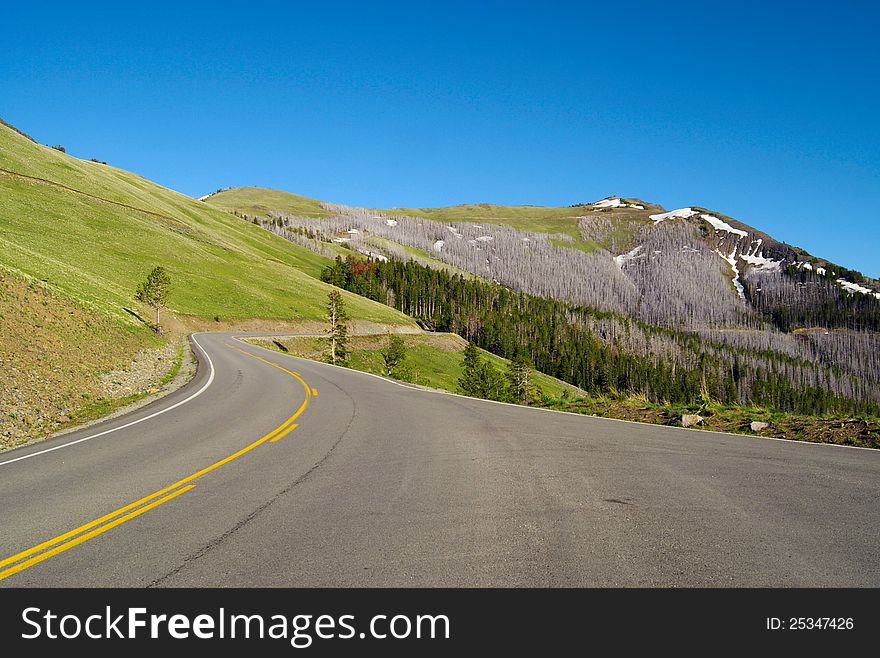 Mountain highway with blue sky. Mountain highway with blue sky