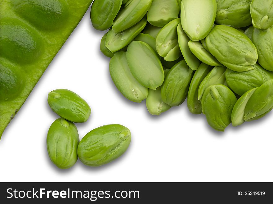 Fresh petai beans and peeled ones on white background with shadow