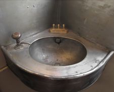 Old Corner Single Metal Sink. Royalty Free Stock Photography
