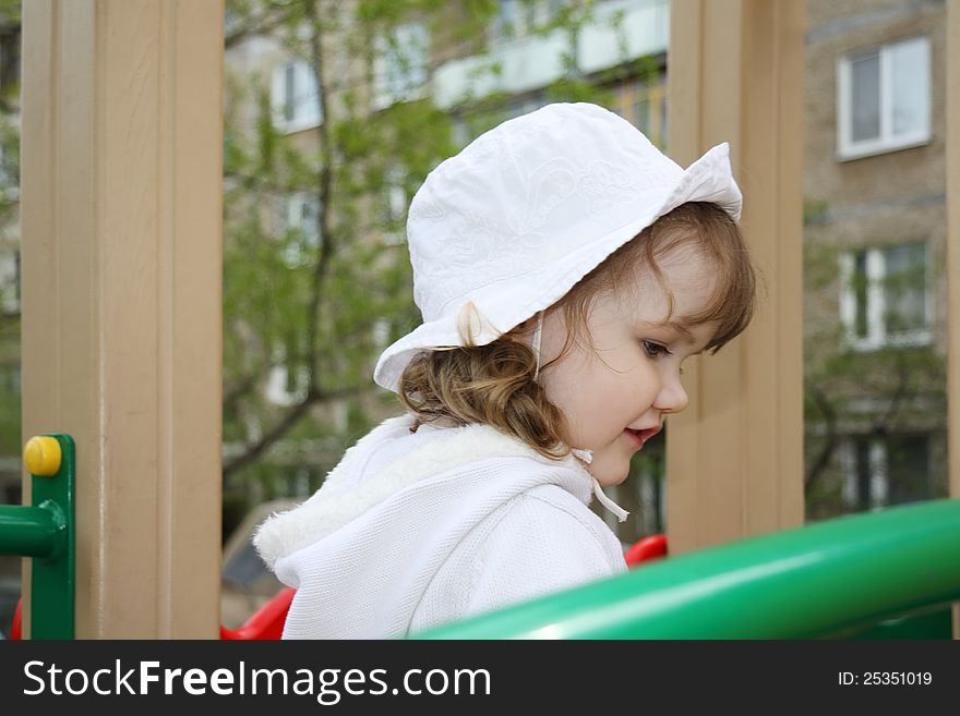 Beautiful Little Girl At Playground