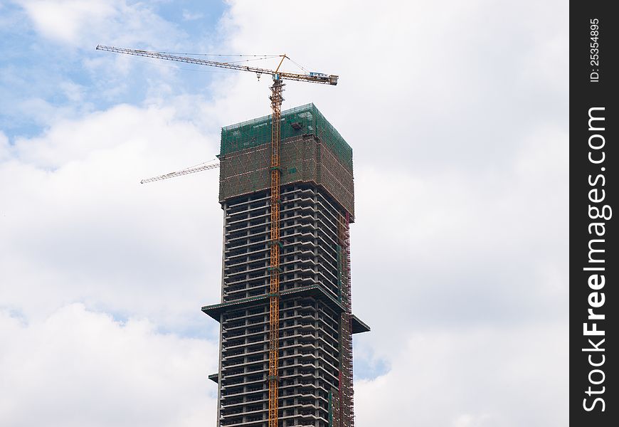 Buildings under construction with cranes