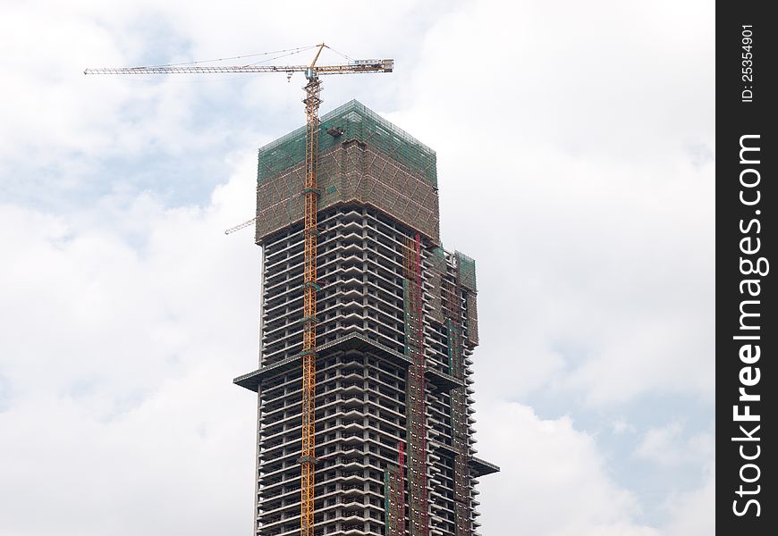 Buildings under construction with cranes