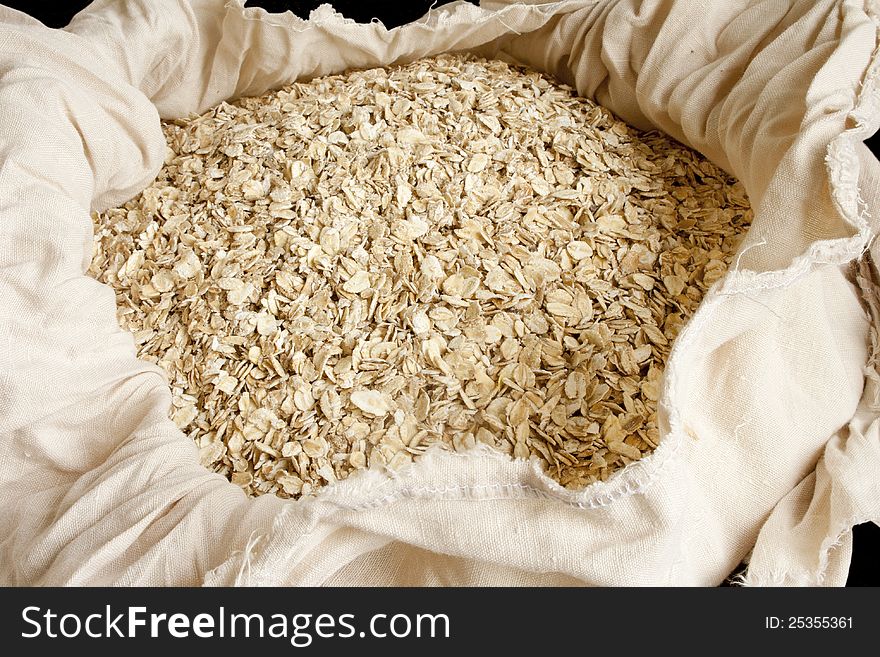 Dry rolled oats in small bag