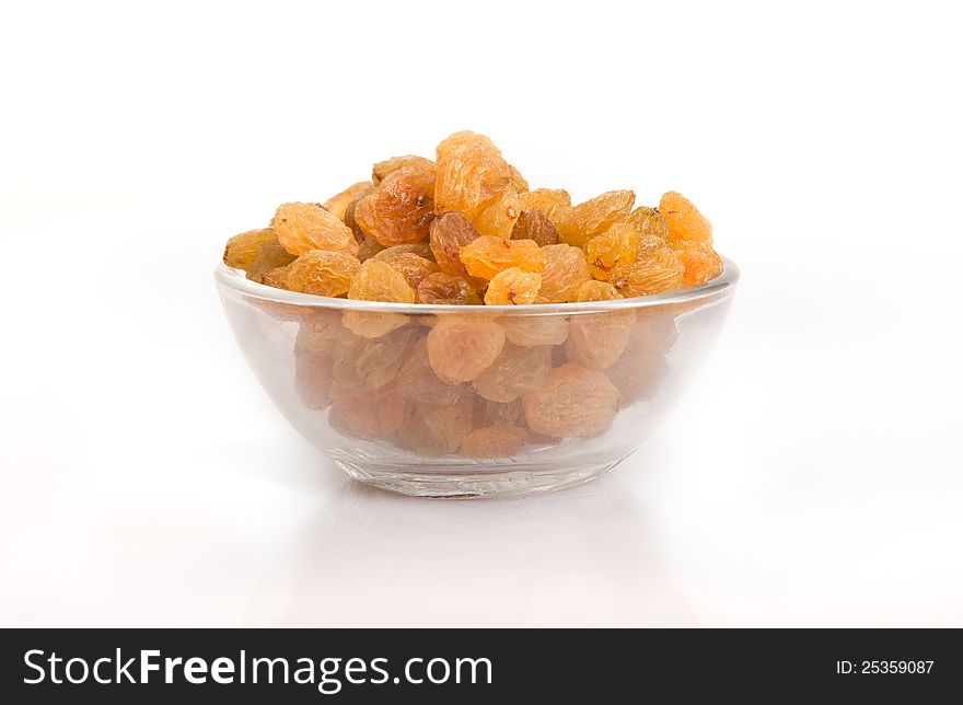 Pile of raisins or black currant on a white background