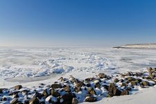 Frozen Lake With Crushed Ice Sheet And Rocks Stock Photo Frozen Lake With Crushed Ice Sheet And Rocks Stock Photo