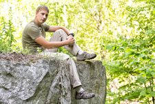 Man On The Edge Of A Cliff Stock Images