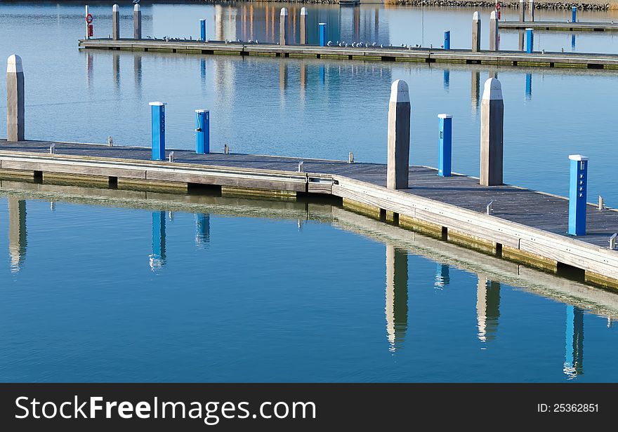 Empty pier in winter during calm weather