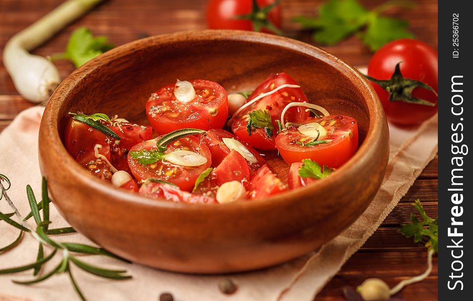 Fresh tomato salad and spice herbs