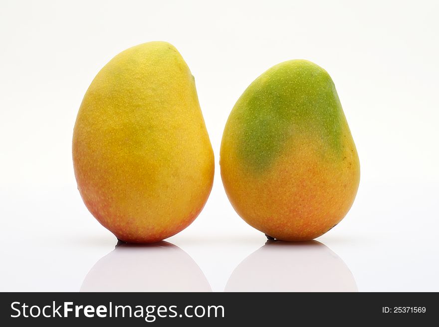Two Mangos on white background