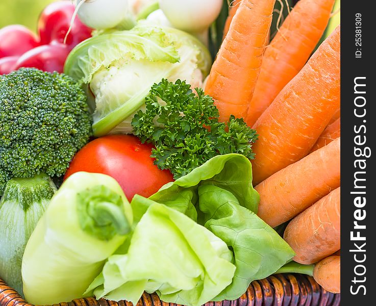 Fresh organic vegetables in a wicker basket