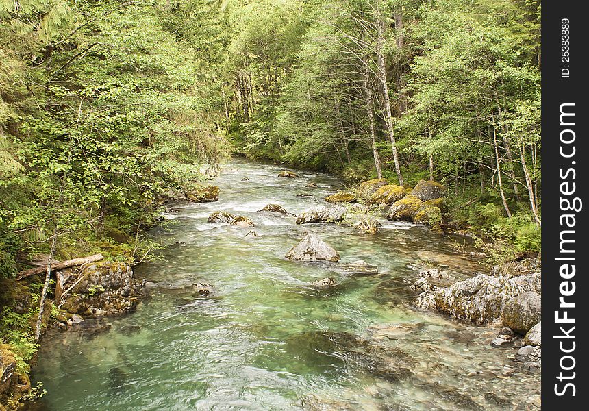 Opal creek Oregon hike. Old mining town with path, water falls and stream that runs into the Santiam river. Opal creek Oregon hike. Old mining town with path, water falls and stream that runs into the Santiam river.