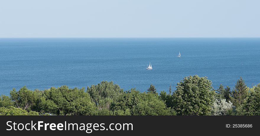 Sea Horizon With Two Yachts