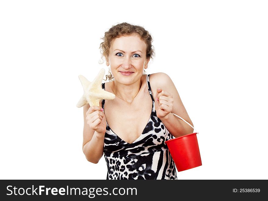 Happy girl with the starfish and bucket isolated