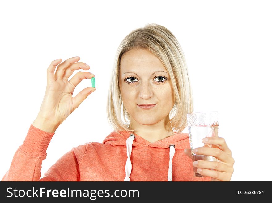 Beautiful girl with medication and water