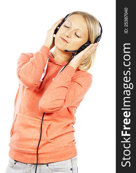 Girl listening to music with headphones isolated. Girl listening to music with headphones isolated