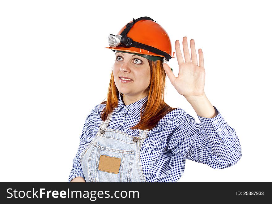 Girl in the builder hard hat welcomes isolated. Girl in the builder hard hat welcomes isolated