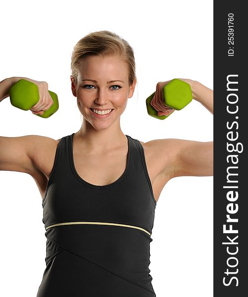 Young Blond Woman working out with dumbbells on a white background. Young Blond Woman working out with dumbbells on a white background