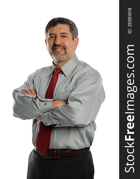 Mature Businessman with crossed arms smiling on a white background