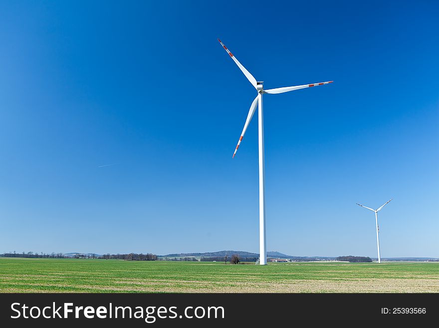 Wind turbine farm, alternative energy on green field. Wind turbine farm, alternative energy on green field