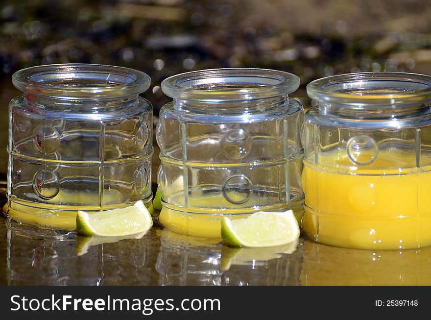 Orange juice and slices of lime