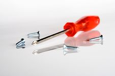 Screwdriver And Screws Stock Photography