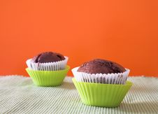 Two Muffins In Green Cups Royalty Free Stock Photos Two Muffins In Green Cups Royalty Free Stock Photos