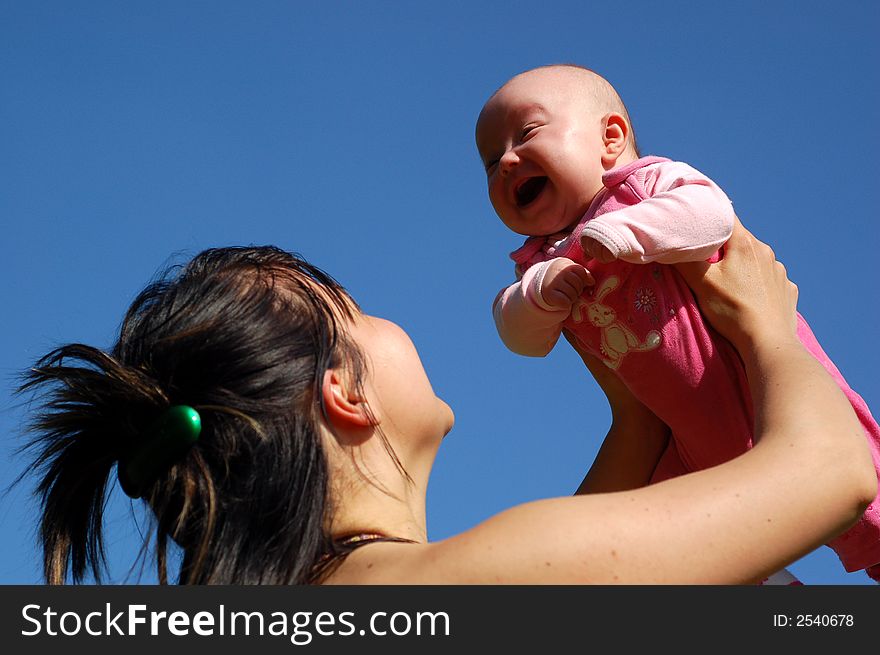 Mother Holding Newborn Baby 11