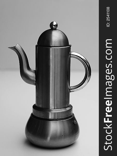 A stainless steel, coffee pot.