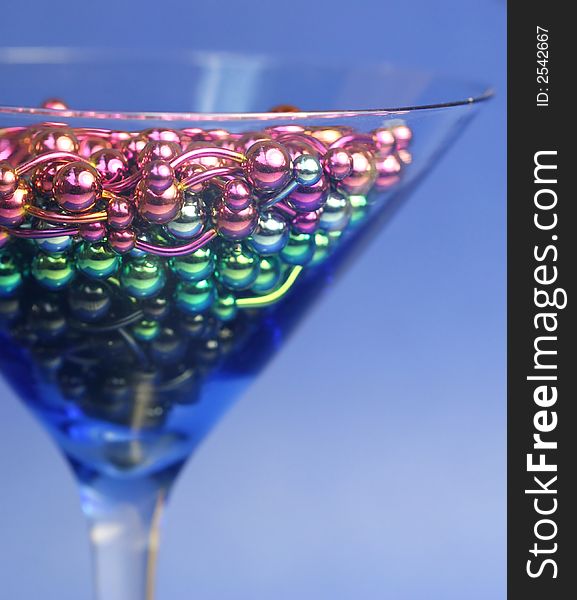 A martini glass full of titanium navel rings