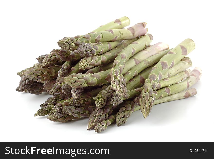 Bunch of fresh cut asparagus on a white background. Bunch of fresh cut asparagus on a white background.