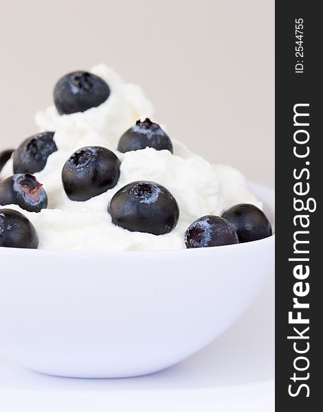 Blueberries in fresh whipped cream and delicious sweet treat!!. Blueberries in fresh whipped cream and delicious sweet treat!!