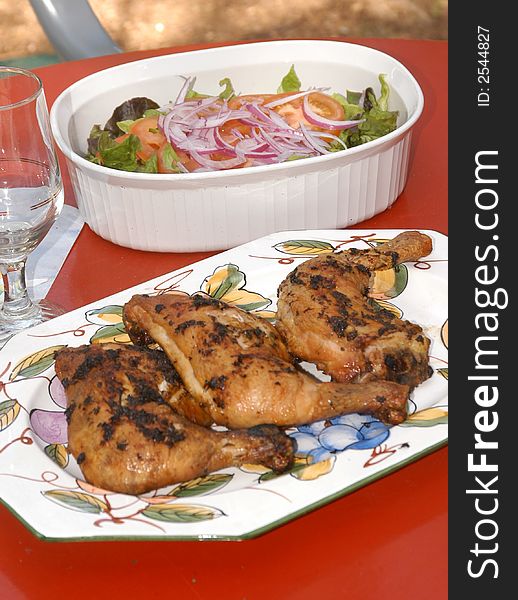 Barbecue chicken leg and healthy salad. Barbecue chicken leg and healthy salad