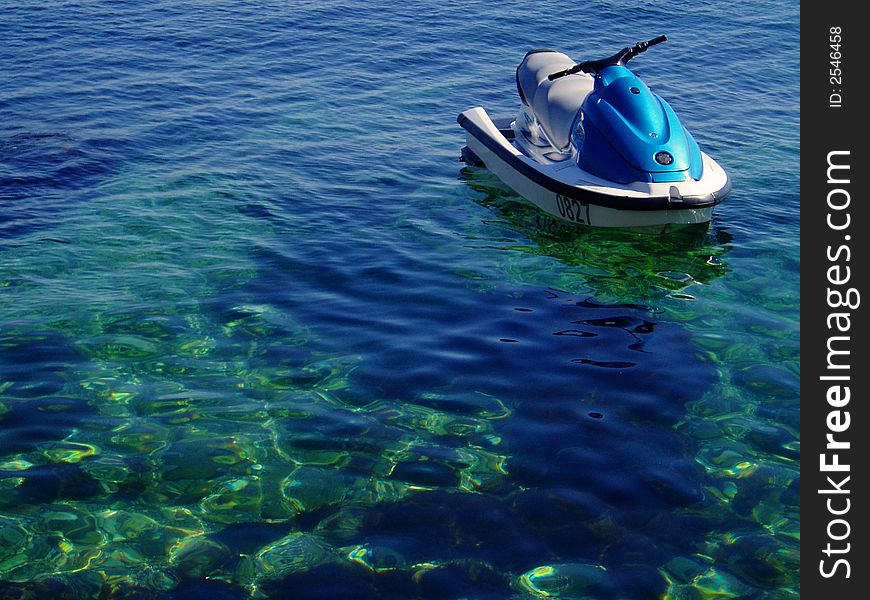 Scooter in the Black sea (Crimea) at summer