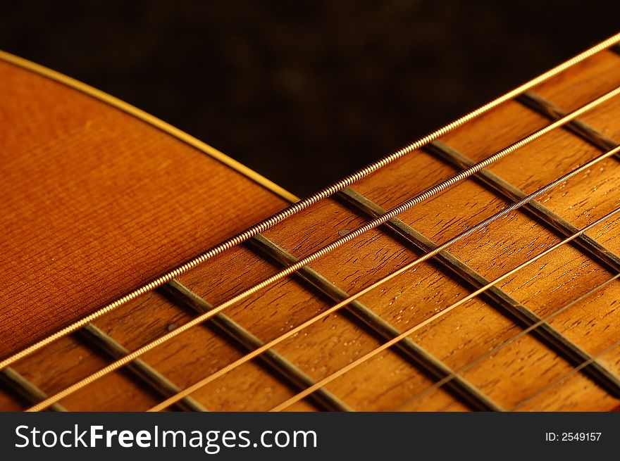 Detail of an acoustic country guitar. Detail of an acoustic country guitar