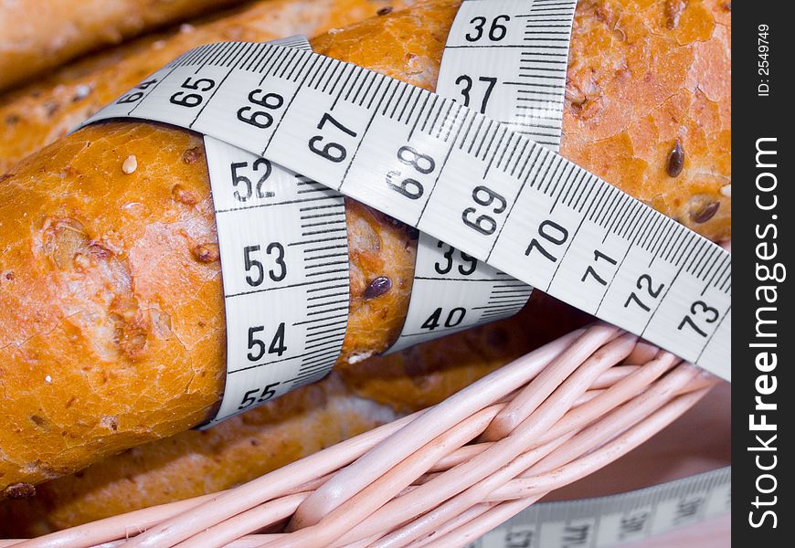 bread roll,rye roll,pastry,crescent,health food,health,fitness,fit,food,snack,macrobiotics,diet,tape measure