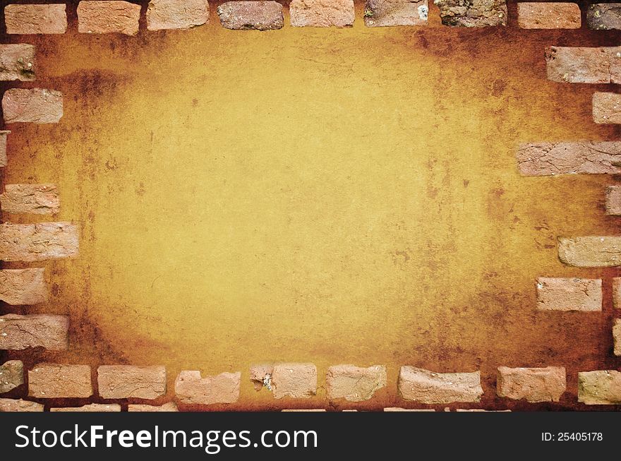 Abstract grungy background with brick wall framing. Abstract grungy background with brick wall framing
