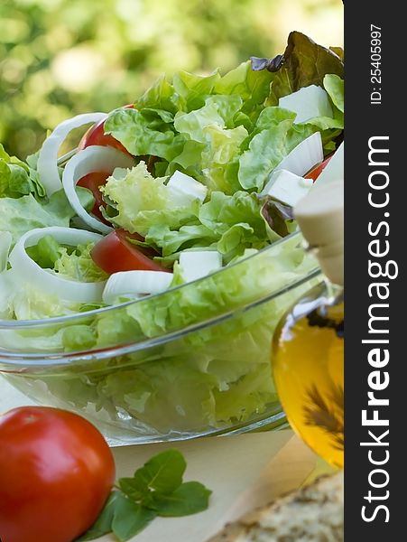 Fresh salad - appetizer is Mediterranean delicious meal in summer heat