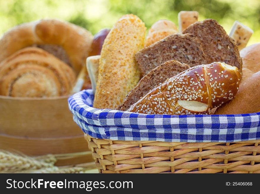 Bread and various pastries in a wicker basket. Bread and various pastries in a wicker basket