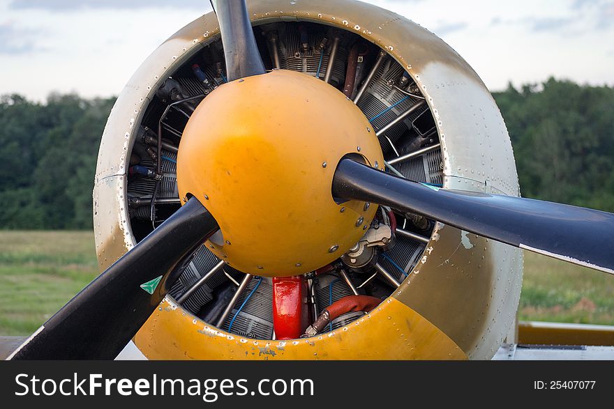 Airplane engine with propeller closeup view.