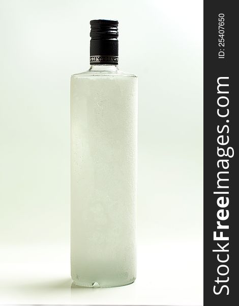 A bottle of chilled vodka.