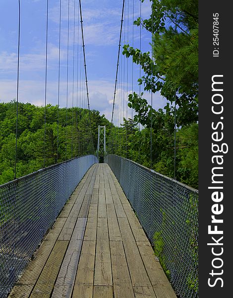 The suspended bridge crossing the chaudiere river near quebec city. The suspended bridge crossing the chaudiere river near quebec city