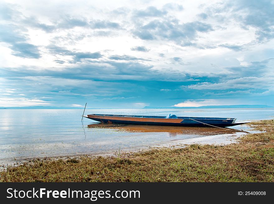 A ship anchoring on the lake shore in Northeaster Thailand. A ship anchoring on the lake shore in Northeaster Thailand.