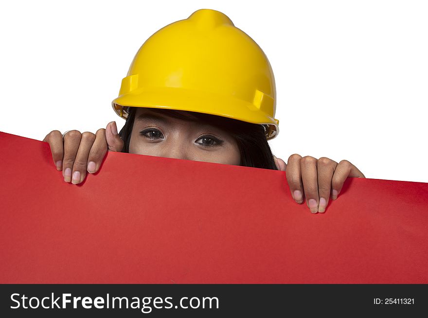 Asian woman architect wearing yellow helmet holding red banner. You can put your message on the banner. Asian woman architect wearing yellow helmet holding red banner. You can put your message on the banner